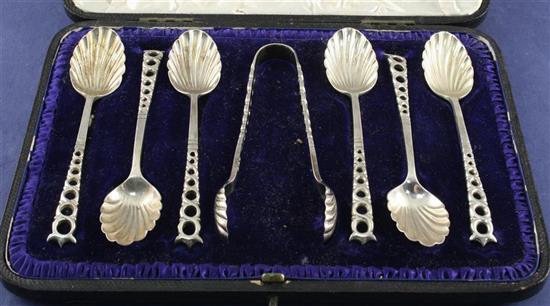 A Victorian cased set of six silver teaspoons with tongs,